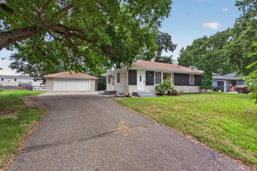Exterior front yard with large 2 car detached garage