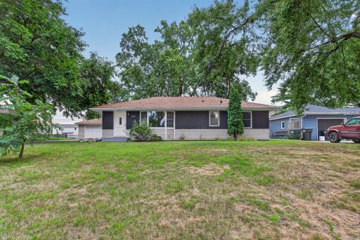 Exterior front yard with large 2 car detached garage