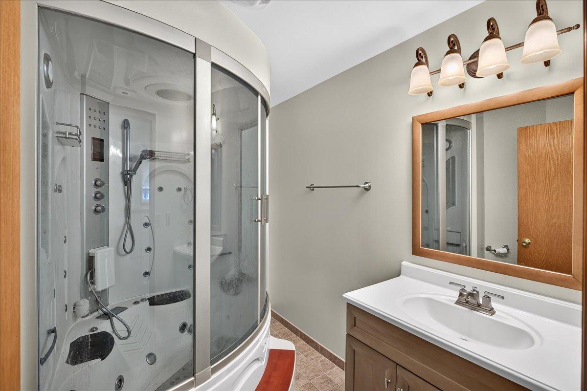 Custom corner Bathtub/Shower with jetted tub. Enjoy an in-home Spa