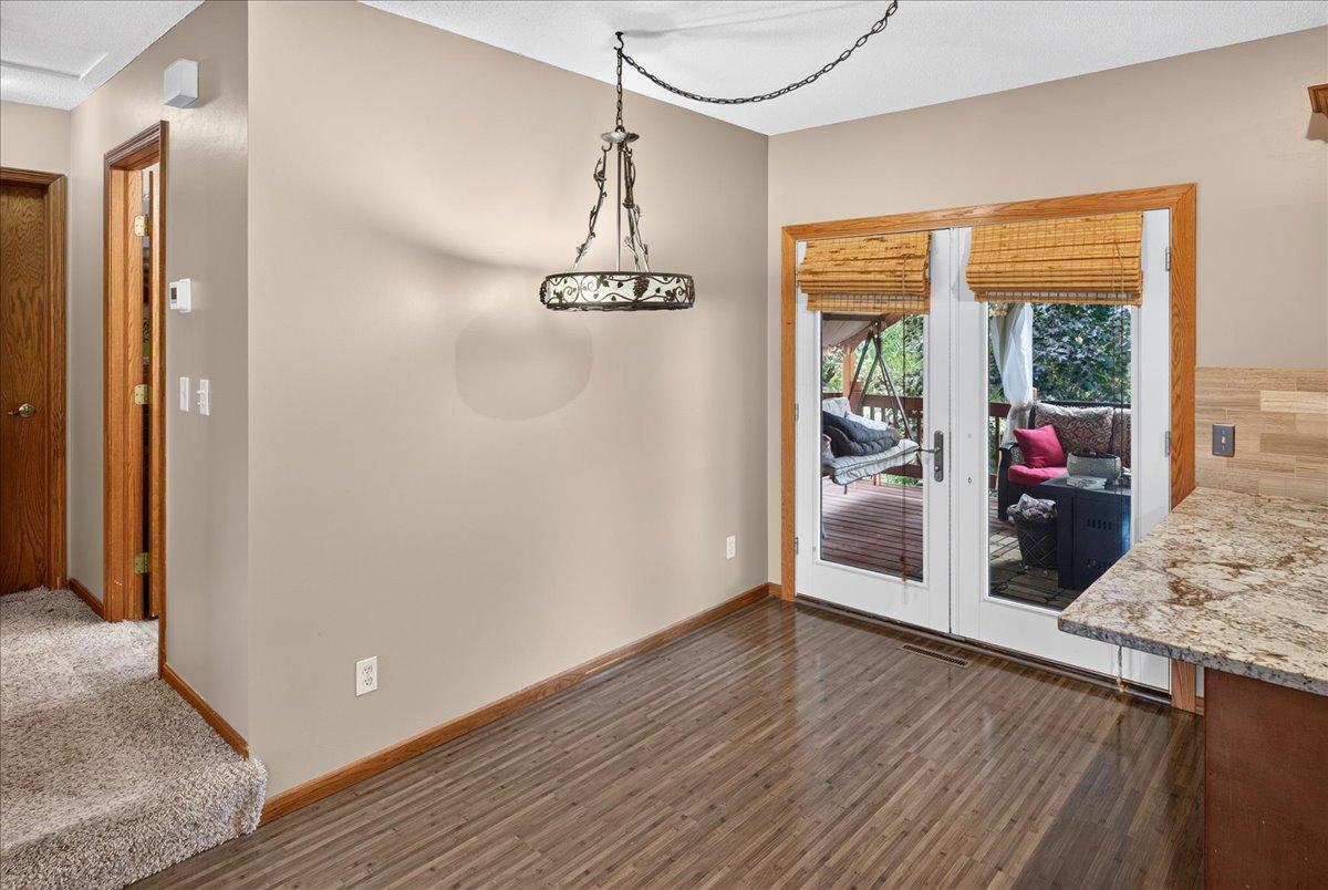 Informal Dining walks out to covered maintenance-free Deck