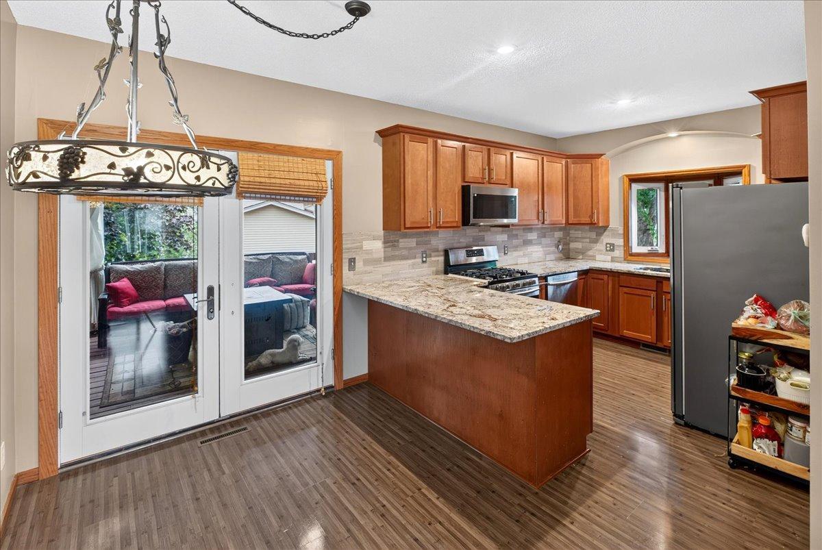 Updated Kitchen with maple cabinets, granite countertops, stainless appliances