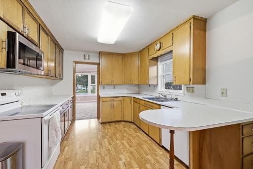 Ample cabinet space for storage and eat in area