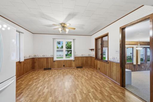 Spacious dining area looks out to the backyard