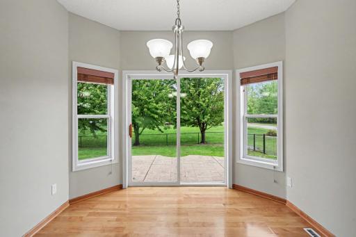 Adjoining to the kitchen is a space for your Dinette with patio door leading to backyard