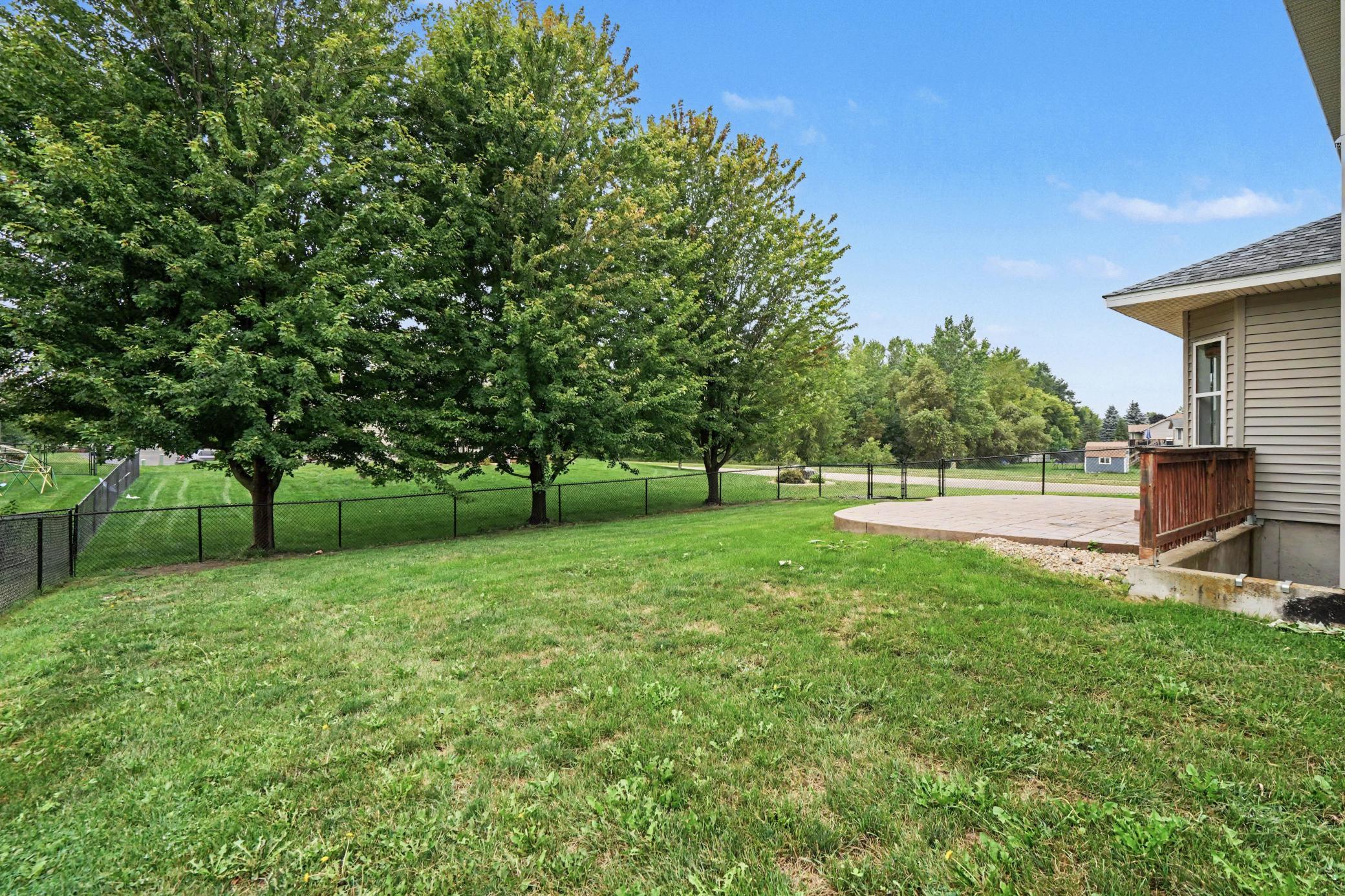 Fenced-in yard with irrigation system