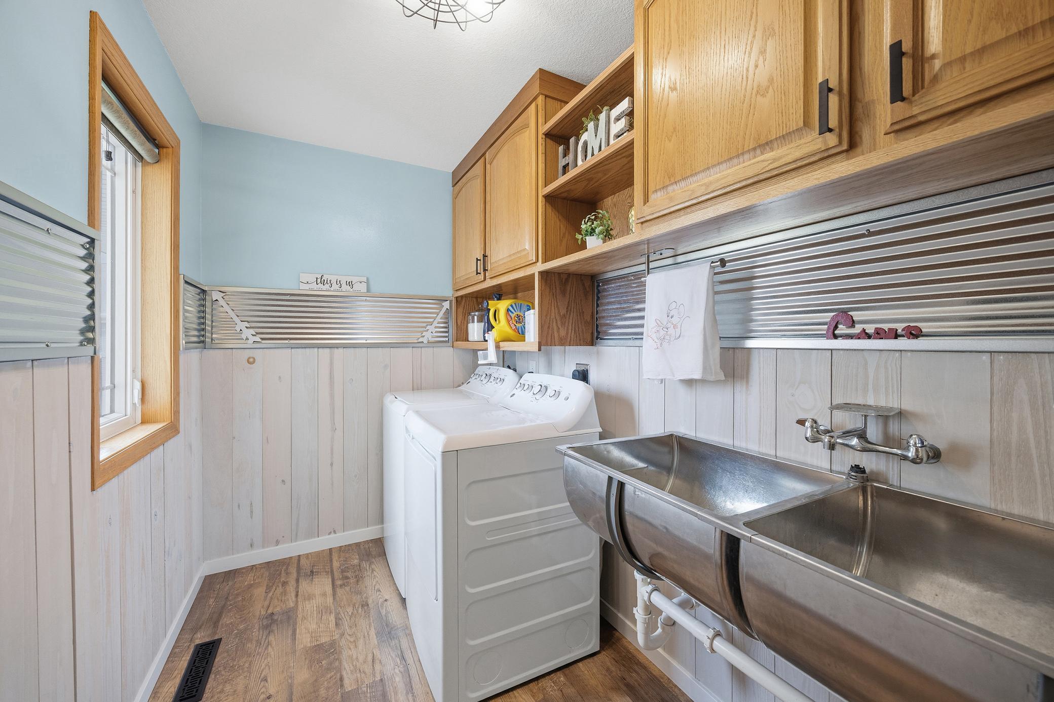 Custom and light filled laundry room + mud room