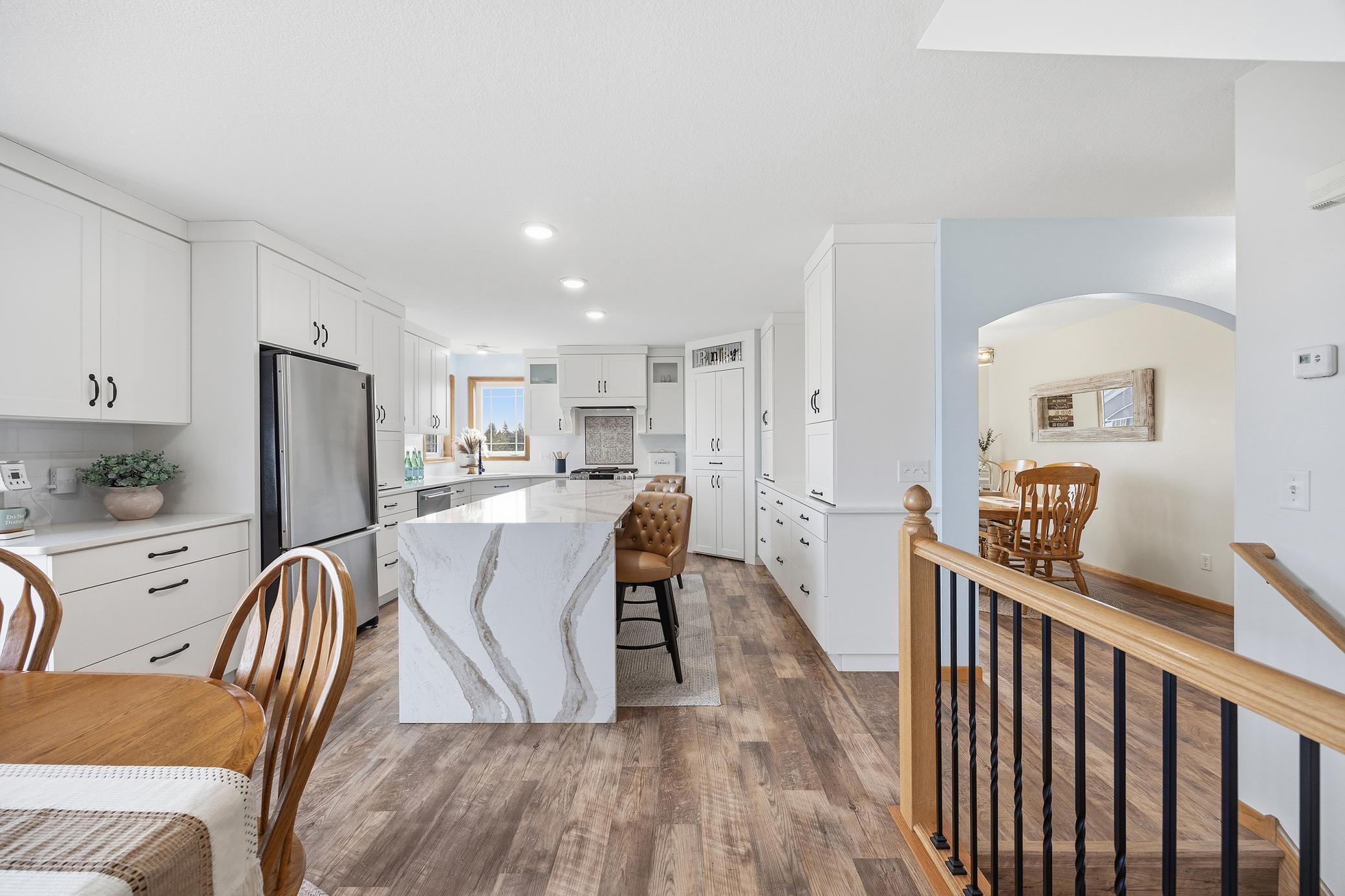 Beautiful Cambria counter tops with waterfall on the island.