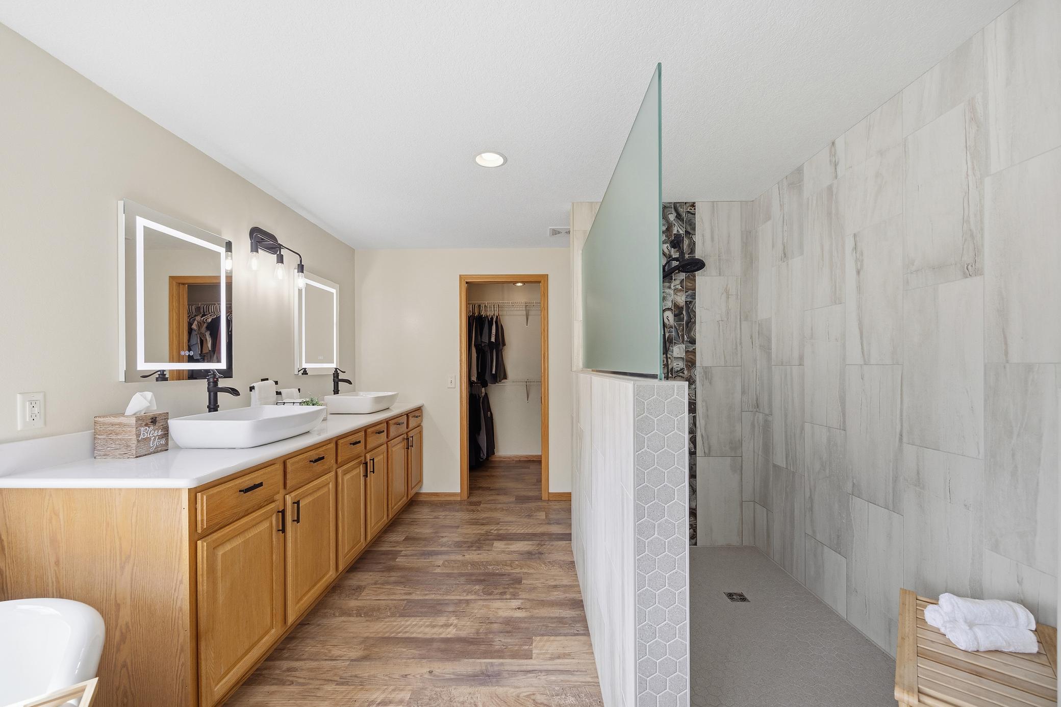Gorgeous primary bathroom with plenty of room & storage