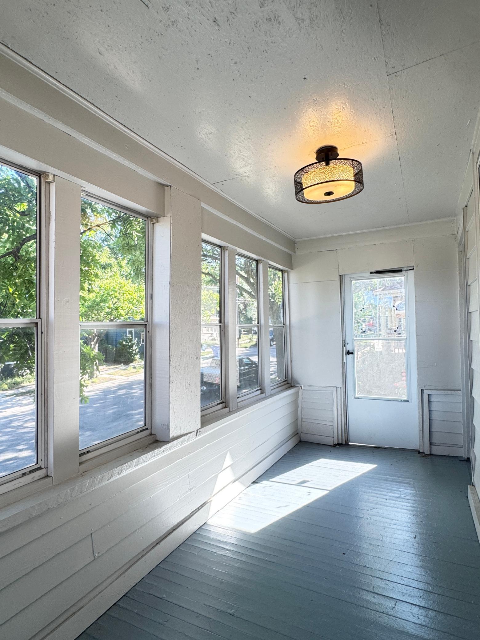 Bright enclosed front entry welcomes you inside with abundant natural light.