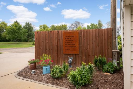 A charming garden corner celebrating what a beautiful world it is, especially here on Fish Lake.