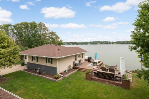 Incredible lakeside setting with ample entertaining space.