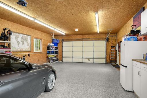 Offering plenty of room for vehicles, lake toys, hobbies, and storage.