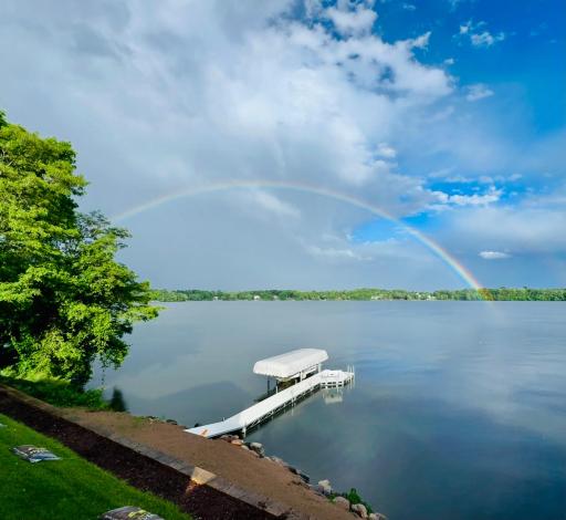 A full rainbow stretching across Fish Lake.