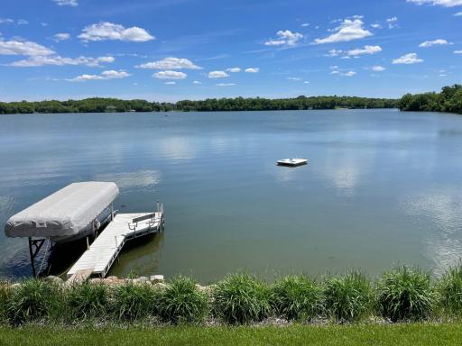 Wide-open Fish Lake views with a swimming dock just off the shoreline.