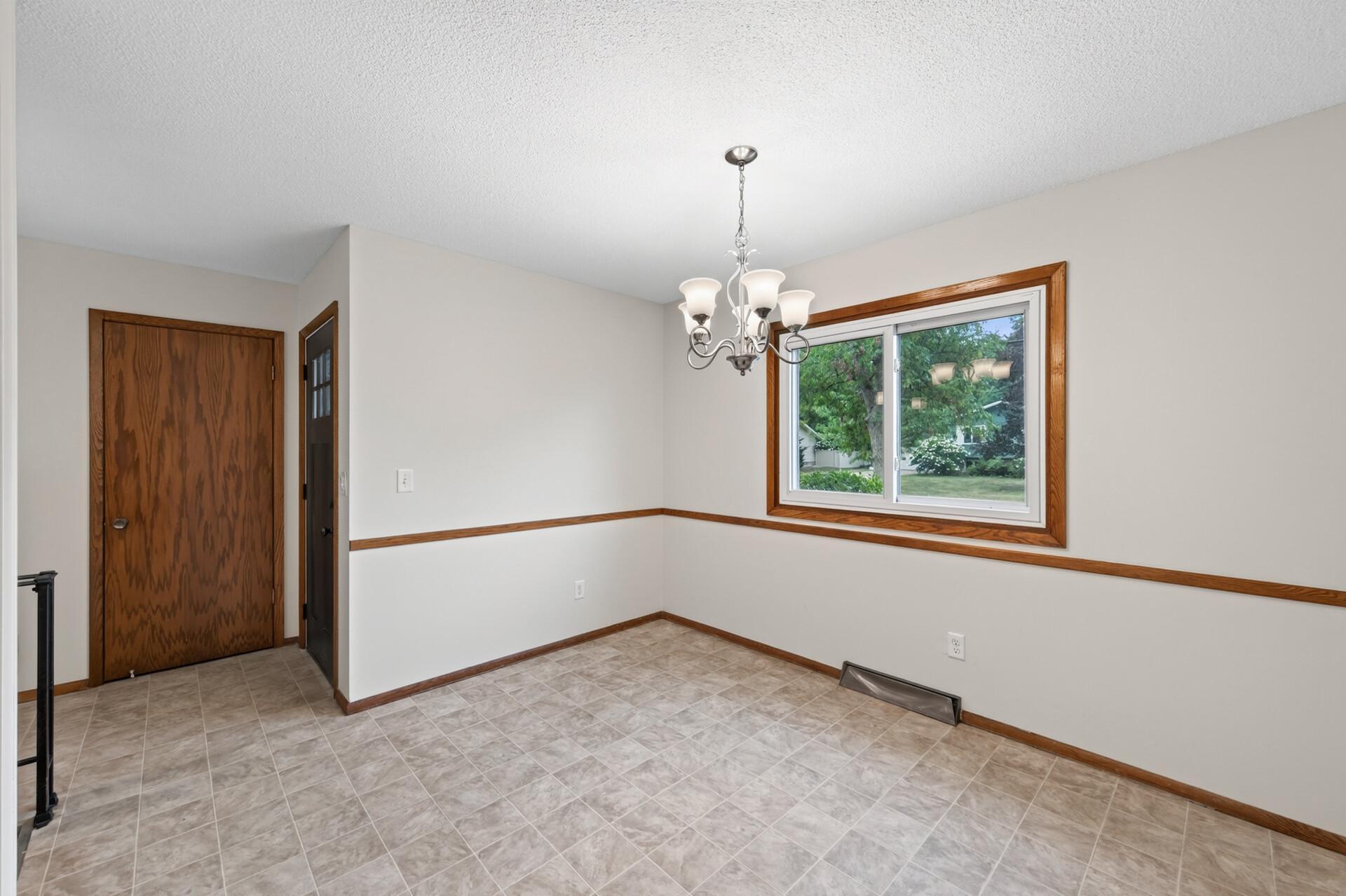 Dining area with front yard views