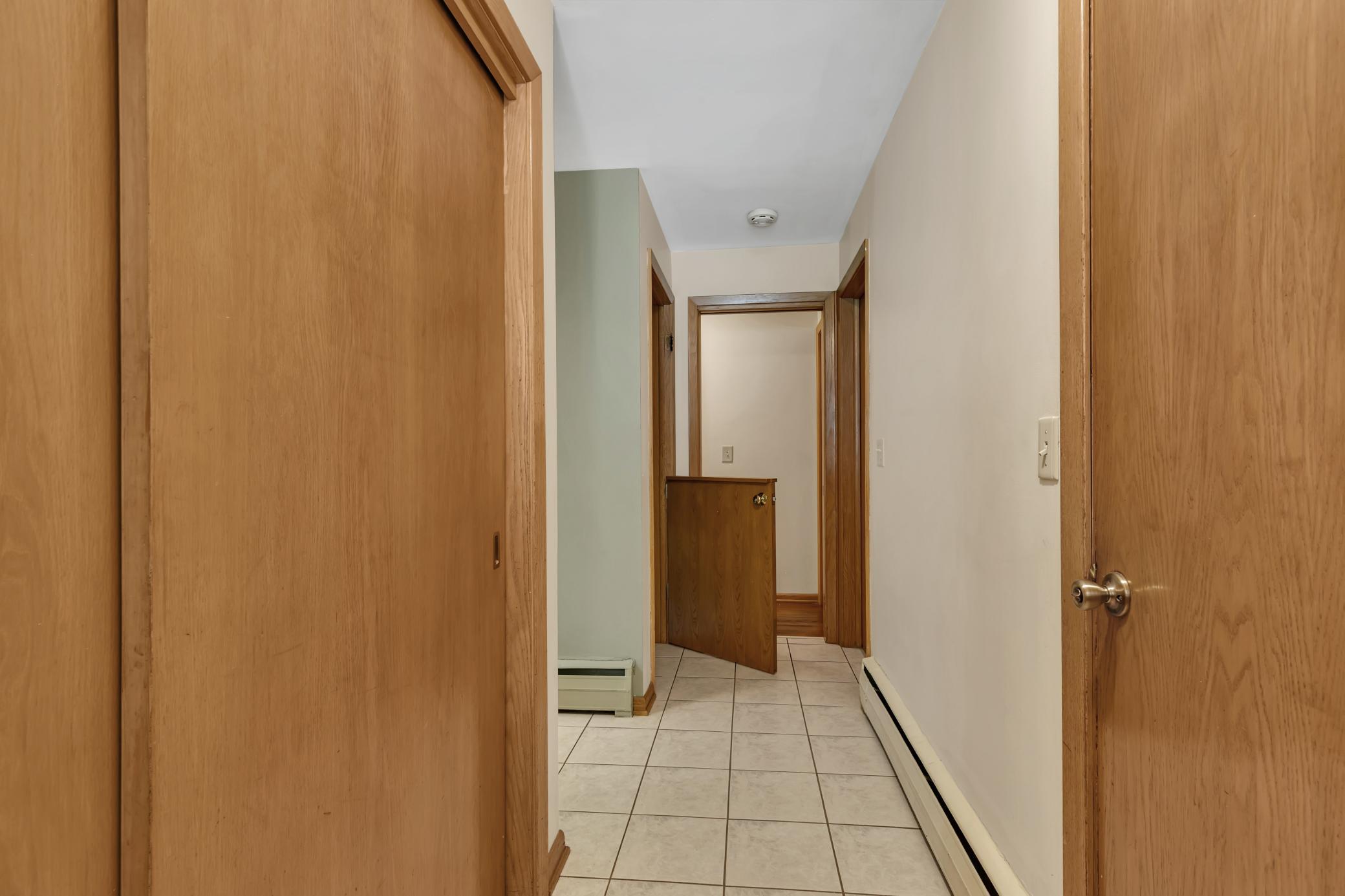 For added convenience and peace of mind, the top of the lower-level stairs features a locking half door—an especially useful feature for families with young children or grandchildren.