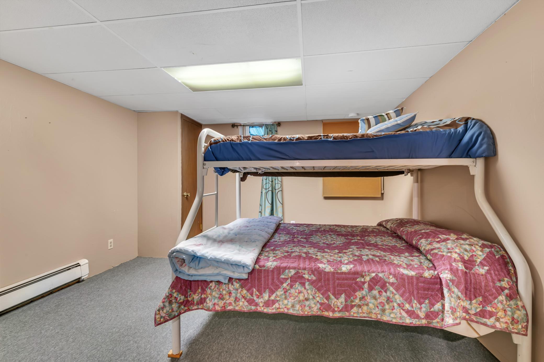 Spacious fifth bedroom.