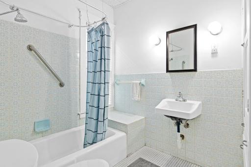 Spacious, tiled bathroom