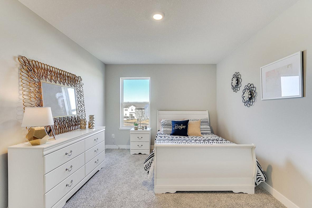 Each of the home's secondary bedrooms are also nice and spacious. Photo of model, colors and options will vary.