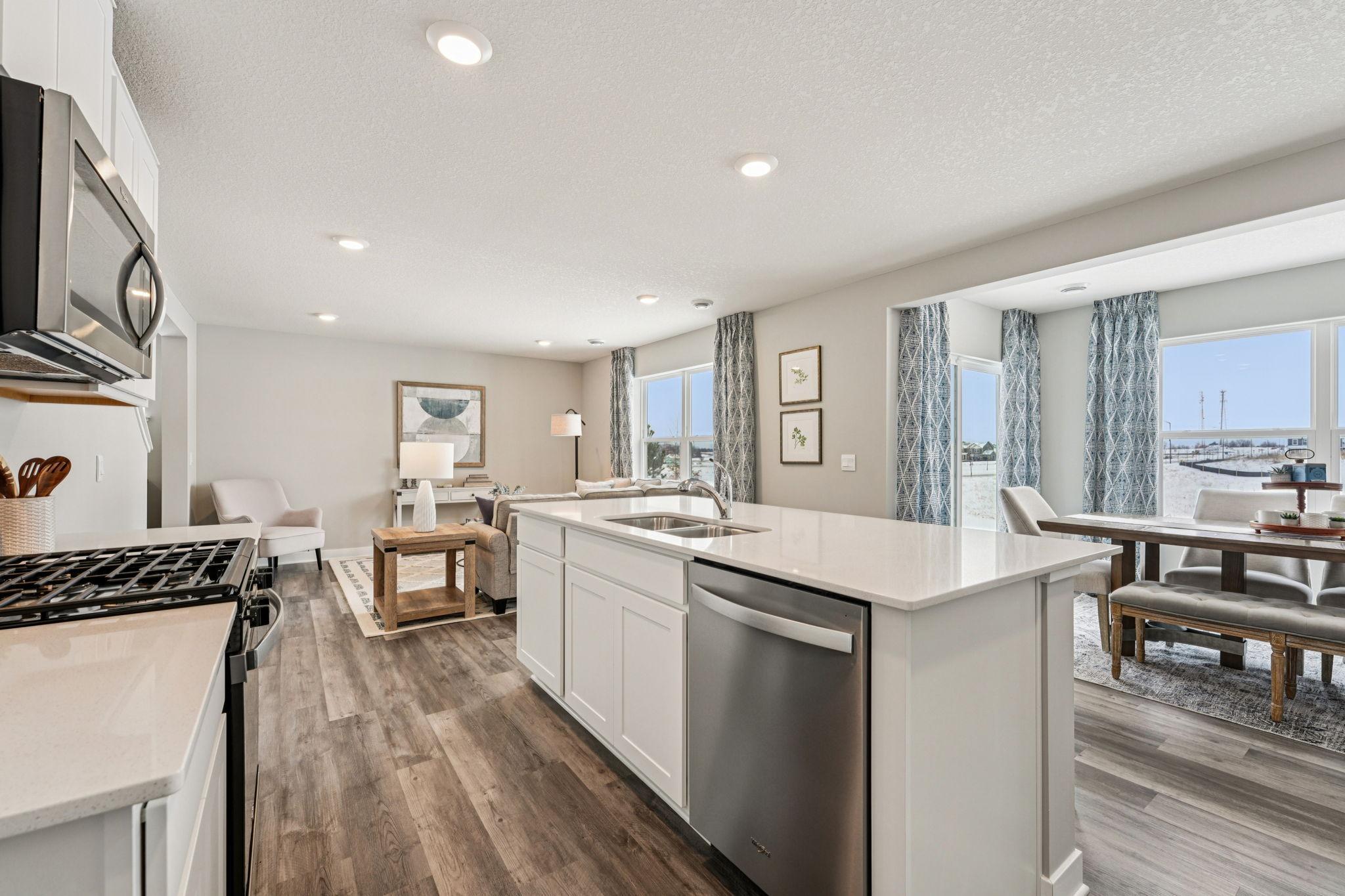 Another view of the Kitchen. Photo of model home, color & options will vary.