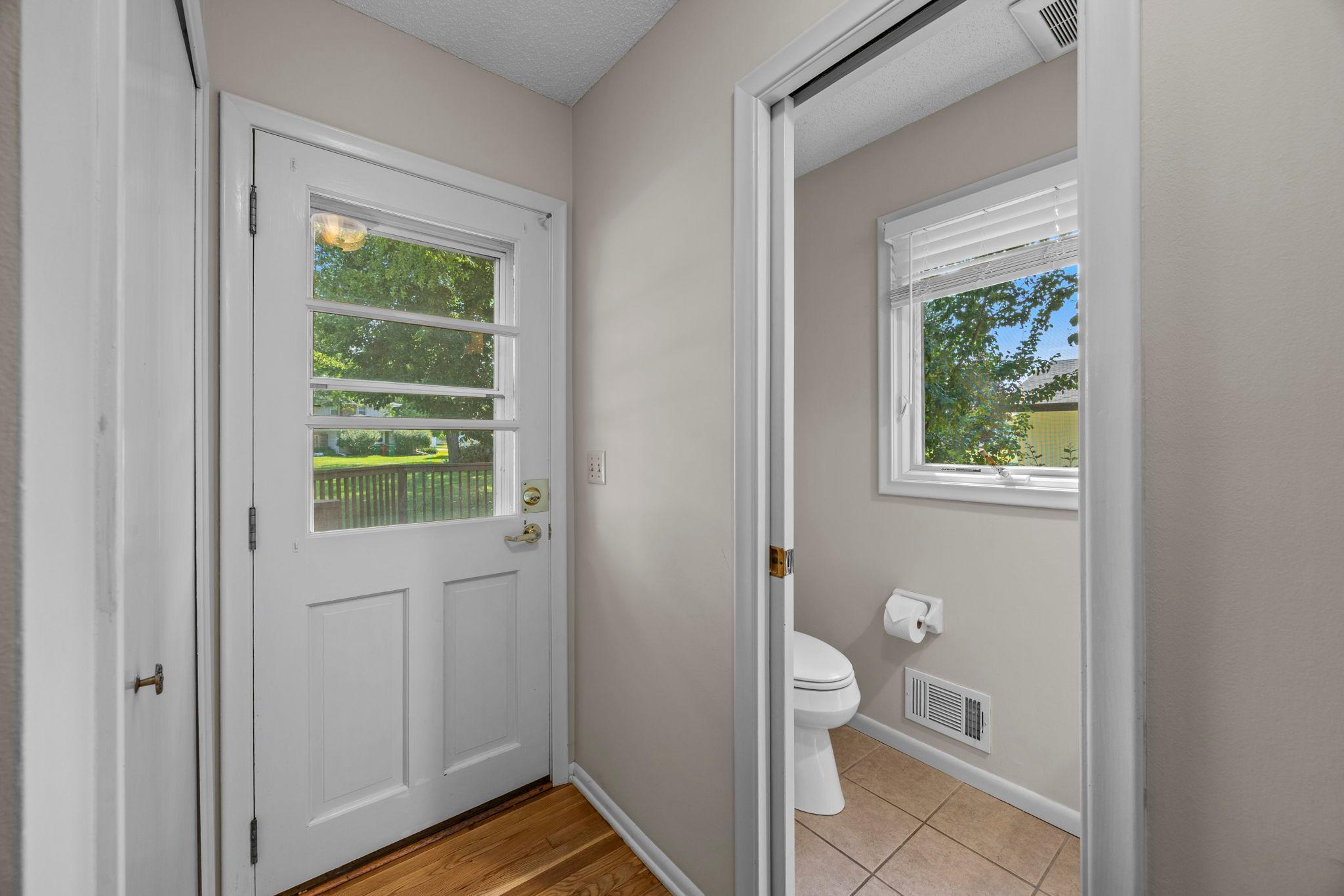 A welcoming entry, dedicated mudroom, convenient half bathroom, and access to the attached 2-car garage round out the main level, with great storage woven throughout.