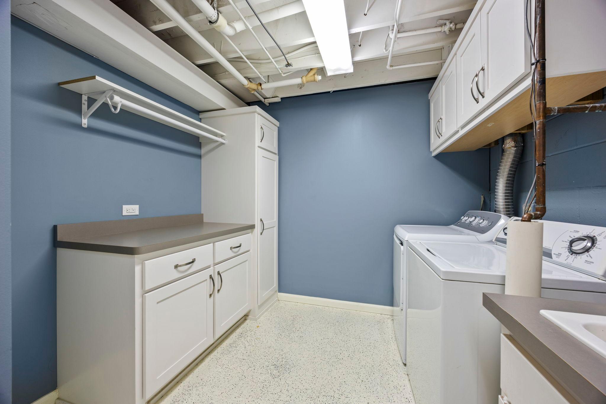 Thoughtfully designed for more than just laundry, this space offers endless possibilities for keeping routines organized.