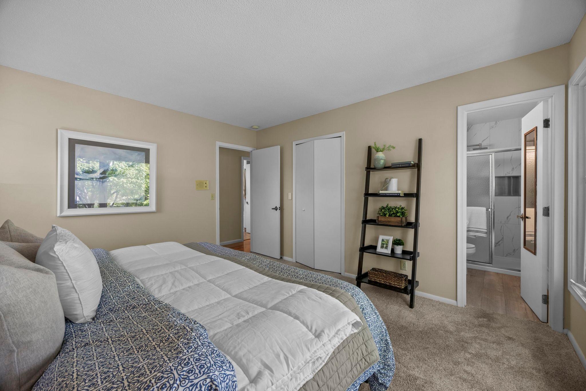 Spacious primary suite with a 7x4 walk-in closet and a private ensuite bathroom.
