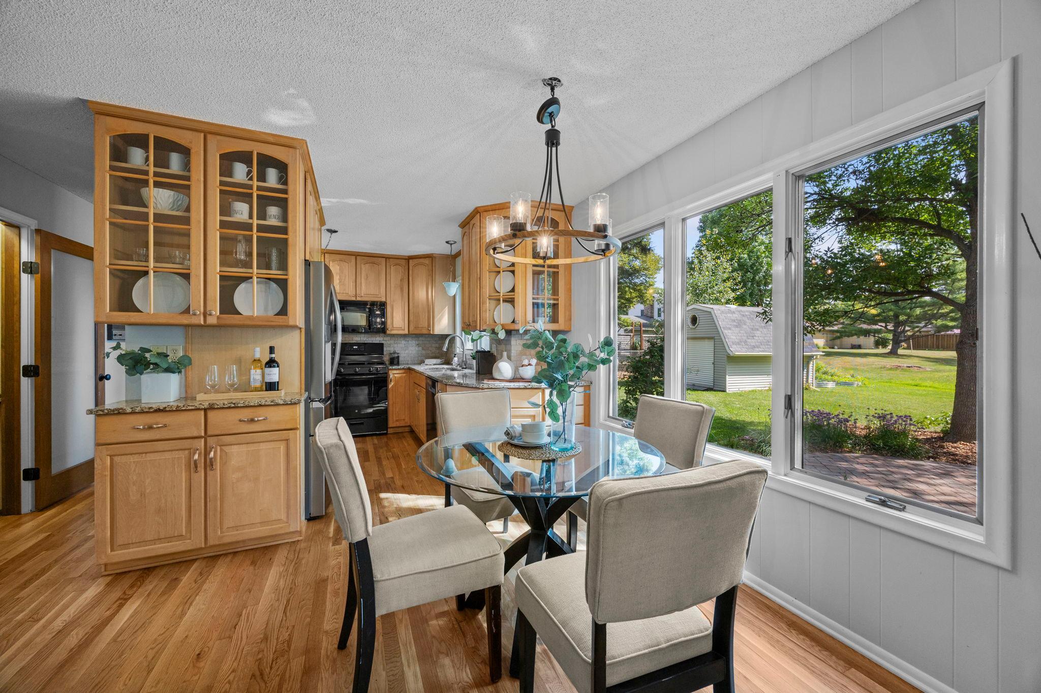 The nearby informal dining space connects easily.