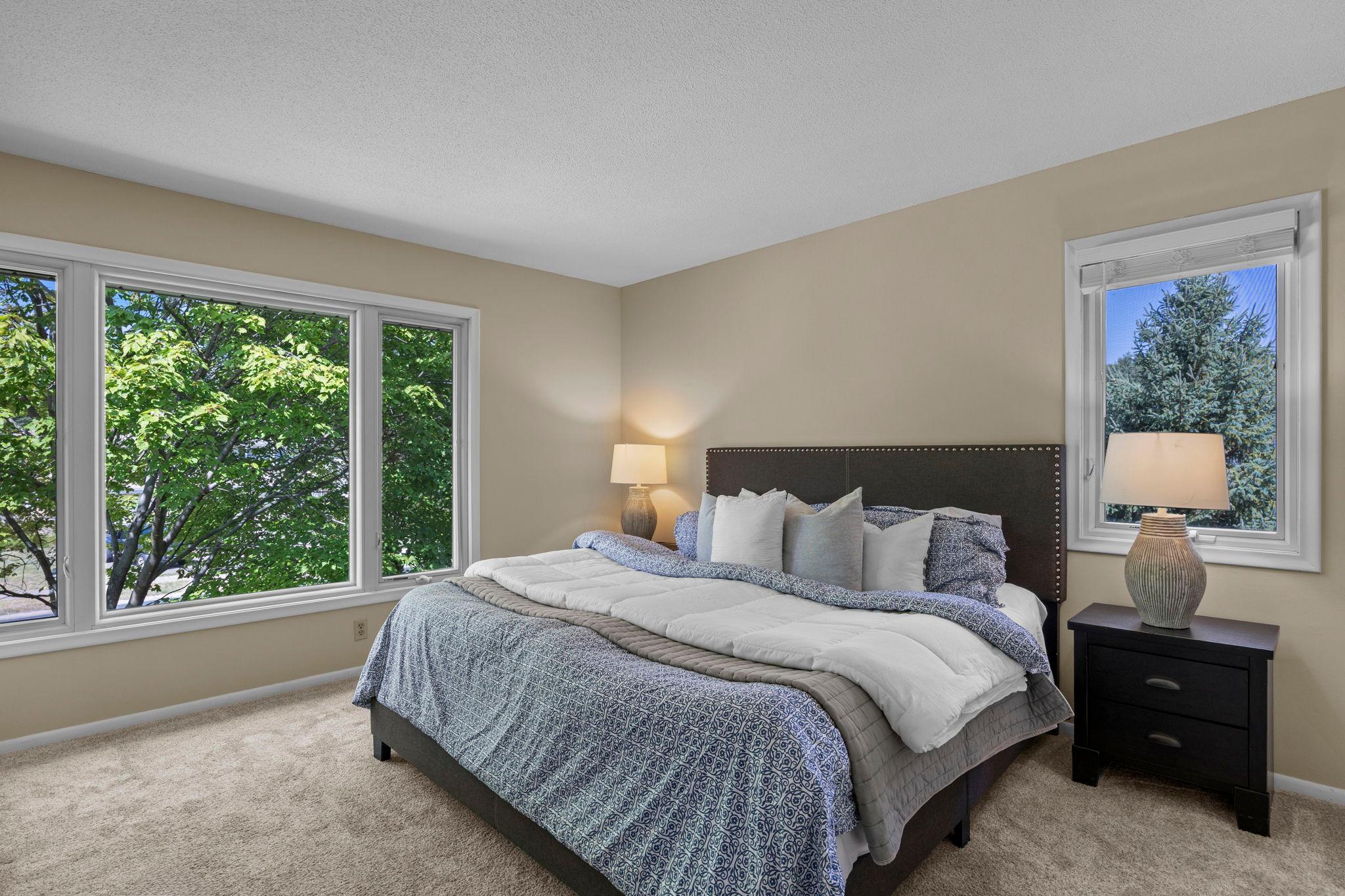 Upstairs, all four bedrooms feature carpeting for added comfort.