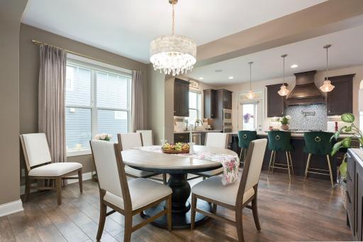 Dining area is spacious with easy access to kitchen.