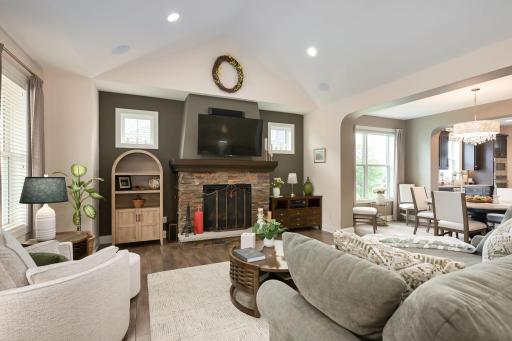 Opens to dining and kitchen for easy flow.