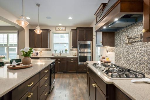 Soft close drawers & doors with new hardware. There is also a walk-in pantry around the corner.