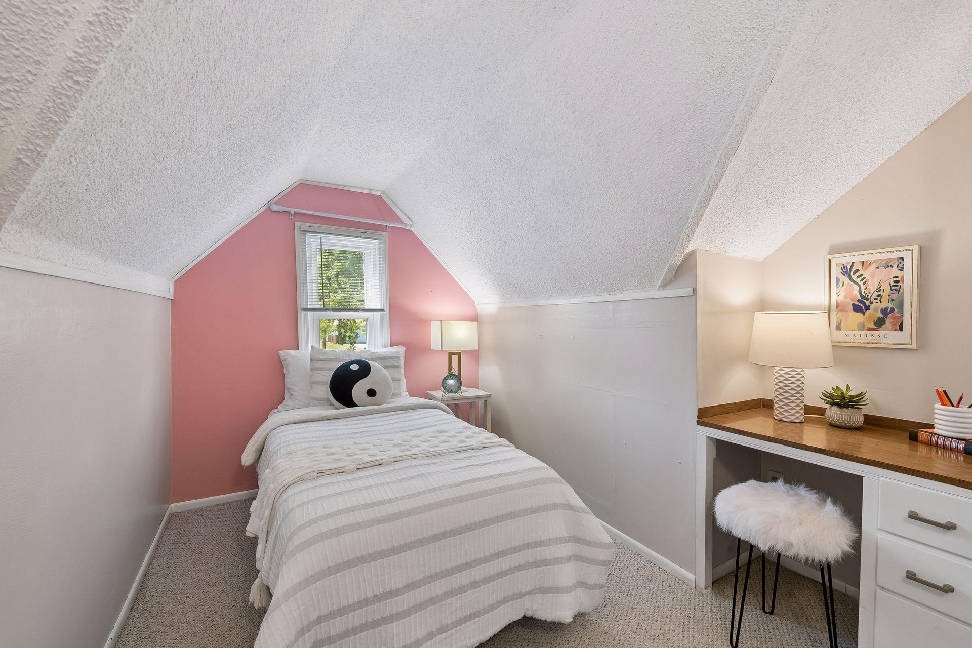 12x8 Upper Level bedroom #3 with White trim, built-in desk, and Carpeted floors.