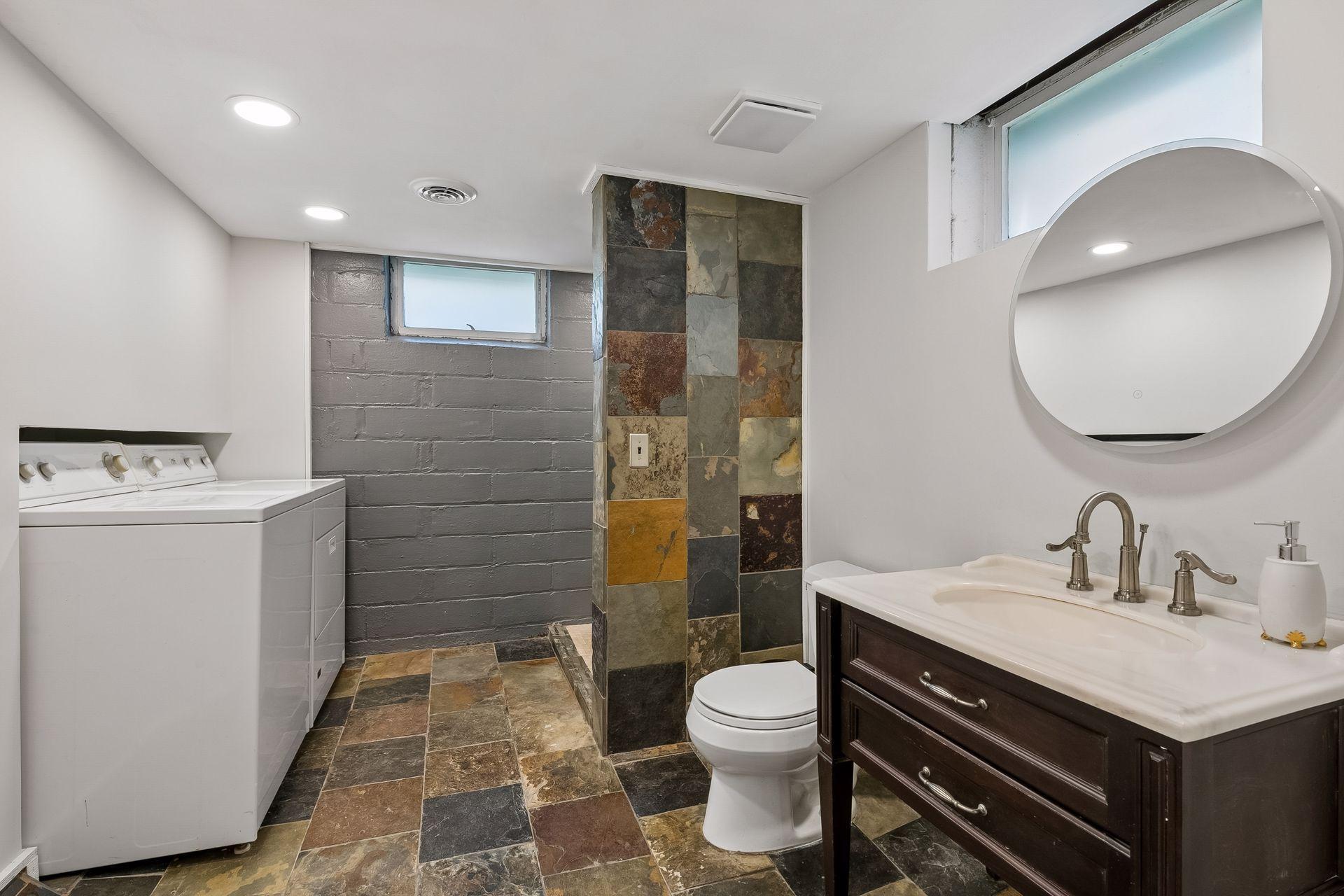 Lower Level 3/4 Bathroom and Laundry
