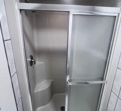 Lower level tiled bathroom