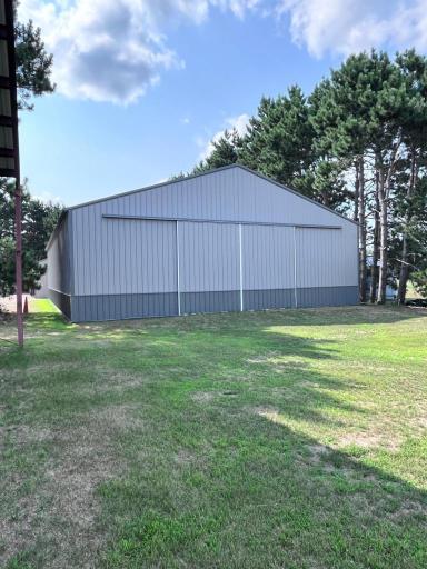Back side of the 50 x 70 building. 14 foot sidewall with 24 x13 sliding doors on either end of the building.