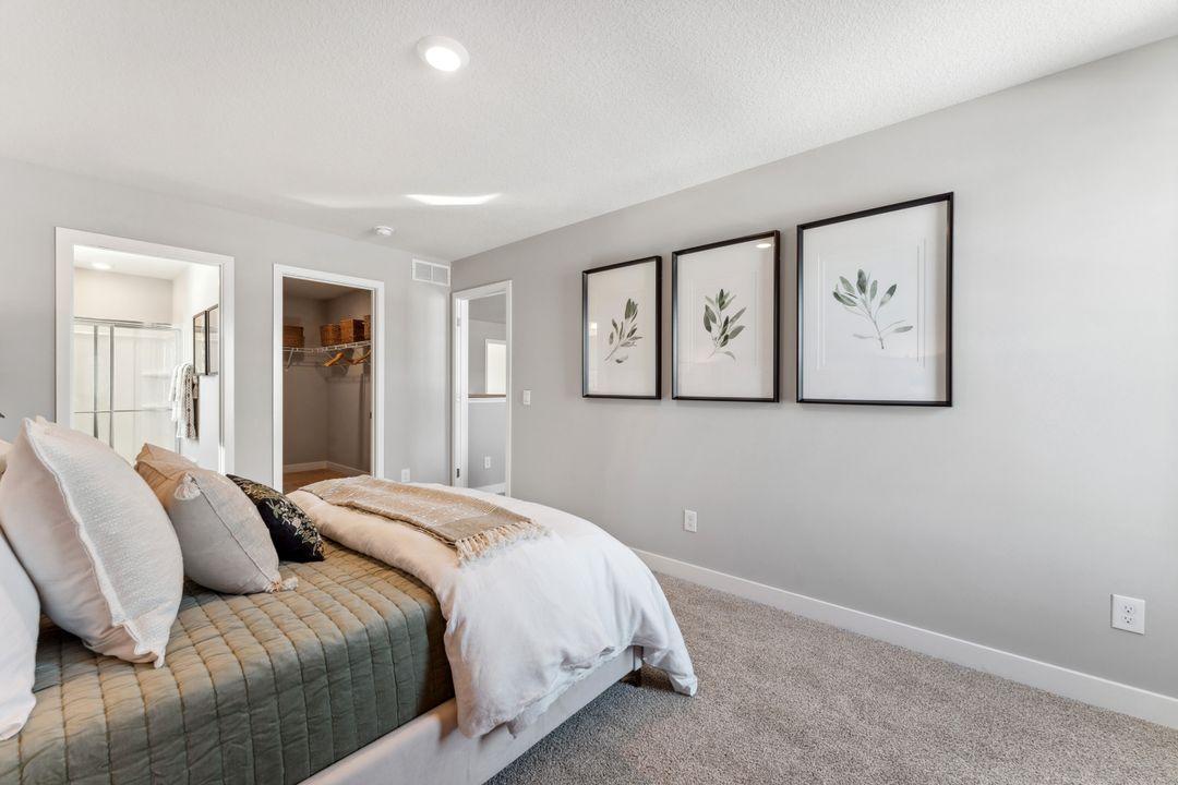 So much space! Photo of model home, colors and finishes are similar.