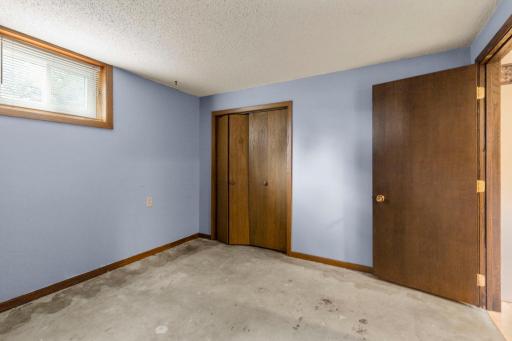 This was used as a den at one time. The carpet has been removed and is not included in the finished square footage.