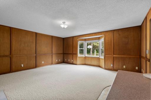 This living room was originally the attached garage! The seller converted it to a living/family room and did all the woodworking himself.