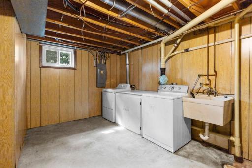 The laundry and furnace are in this room. This area is a possibility for adding a 2nd bathroom.
