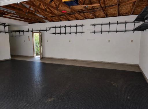 The attached garage is an oversized 24x30.
