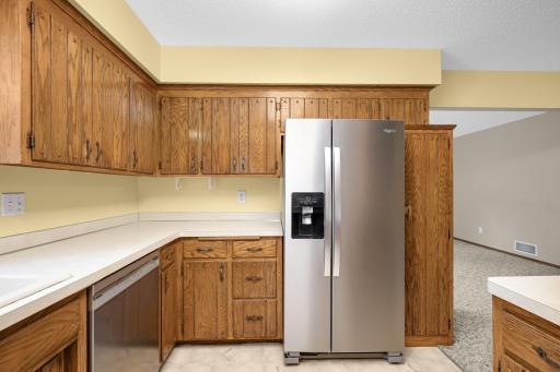 The kitchen features newer appliances.