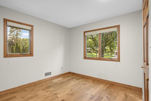 Second bedroom also has windows on two sides and a double closet.