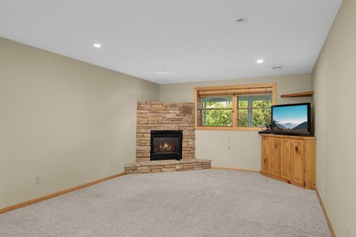 Gas fireplace in family room with look out windows.