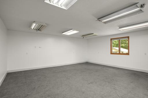 Bonus 2 car space at the back of the garage is drywalled and could easily be heated.