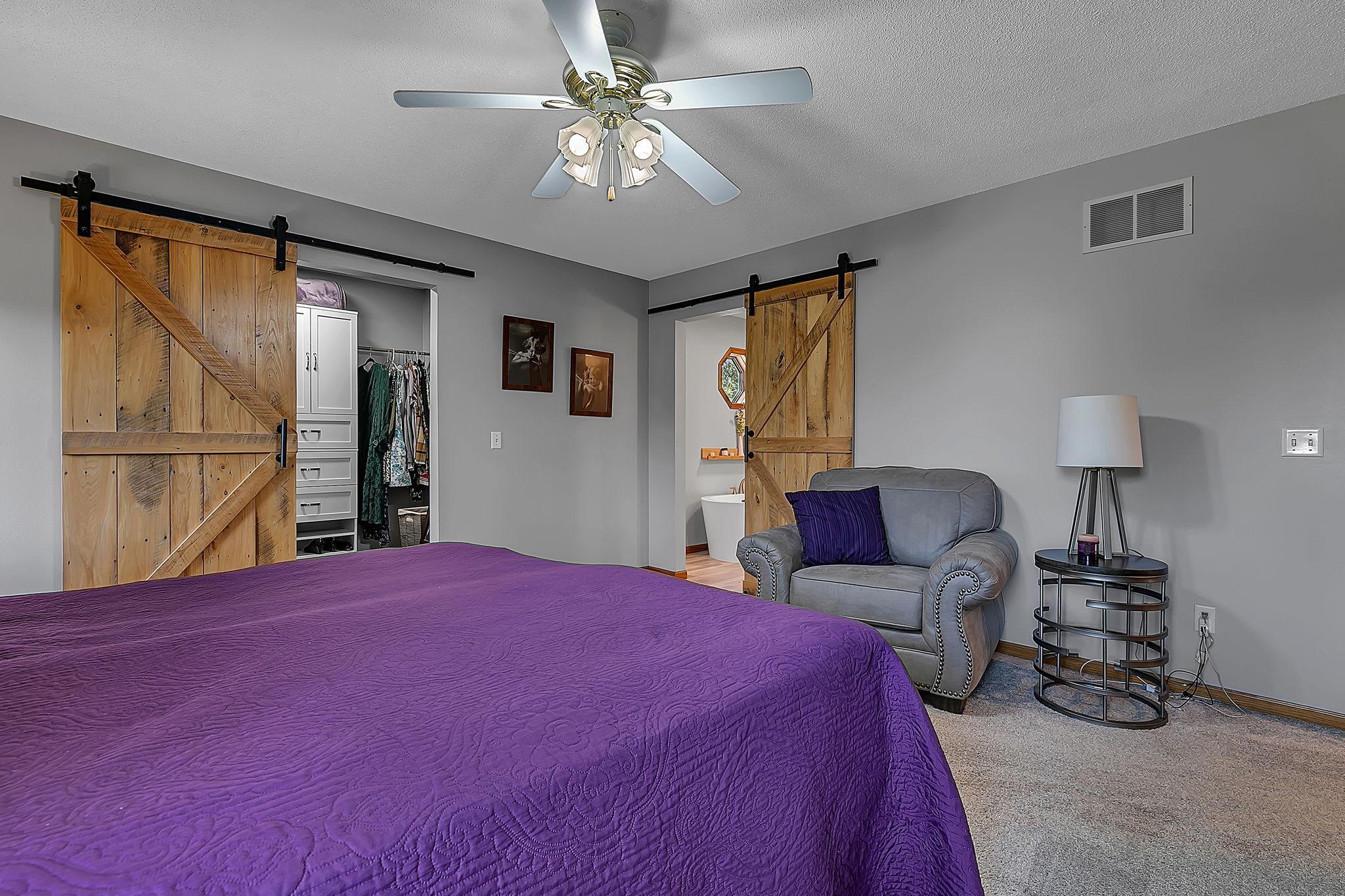 With a walk in closet and private bathroom!