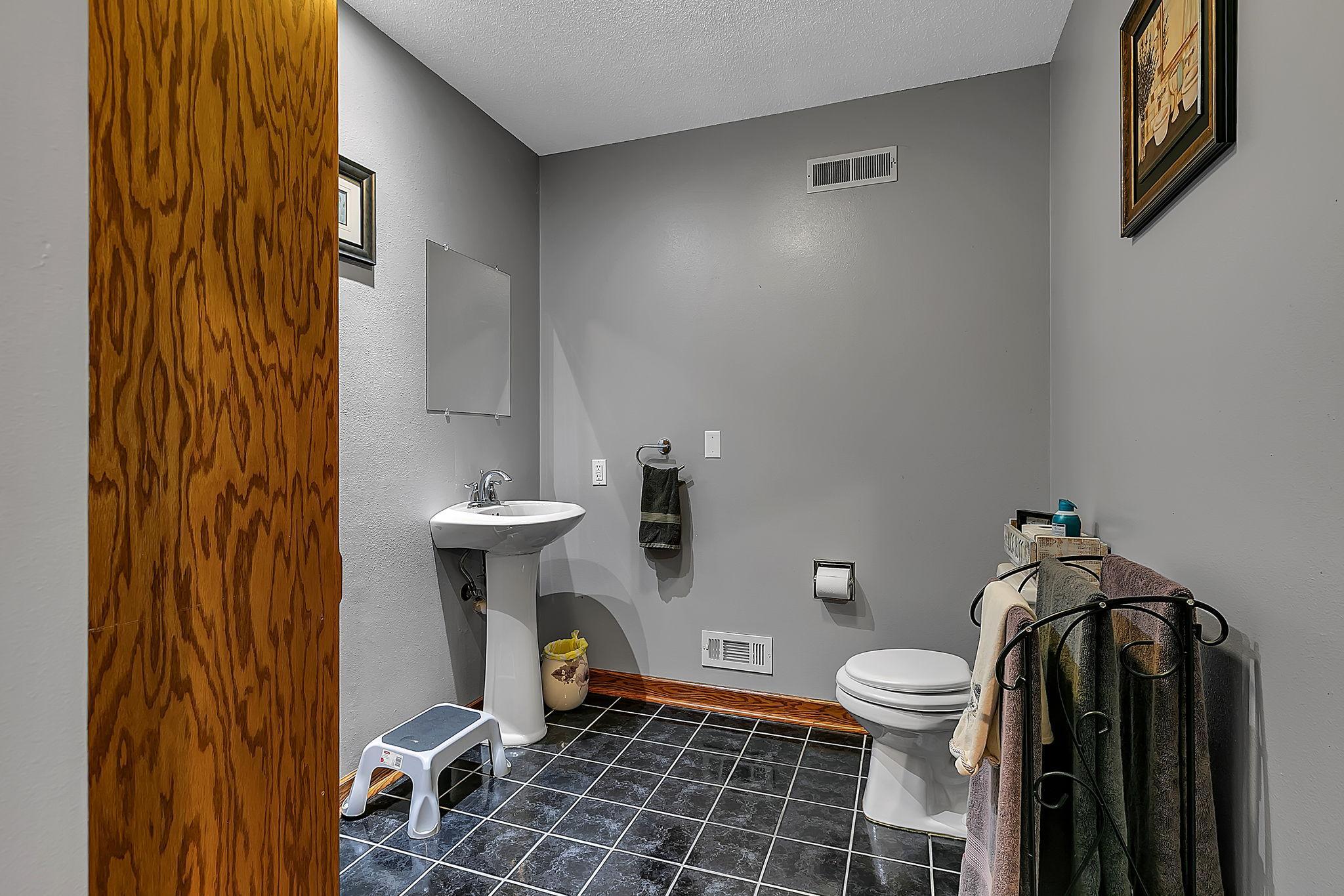 Half bath off the living room, perfect for when guests are over!
