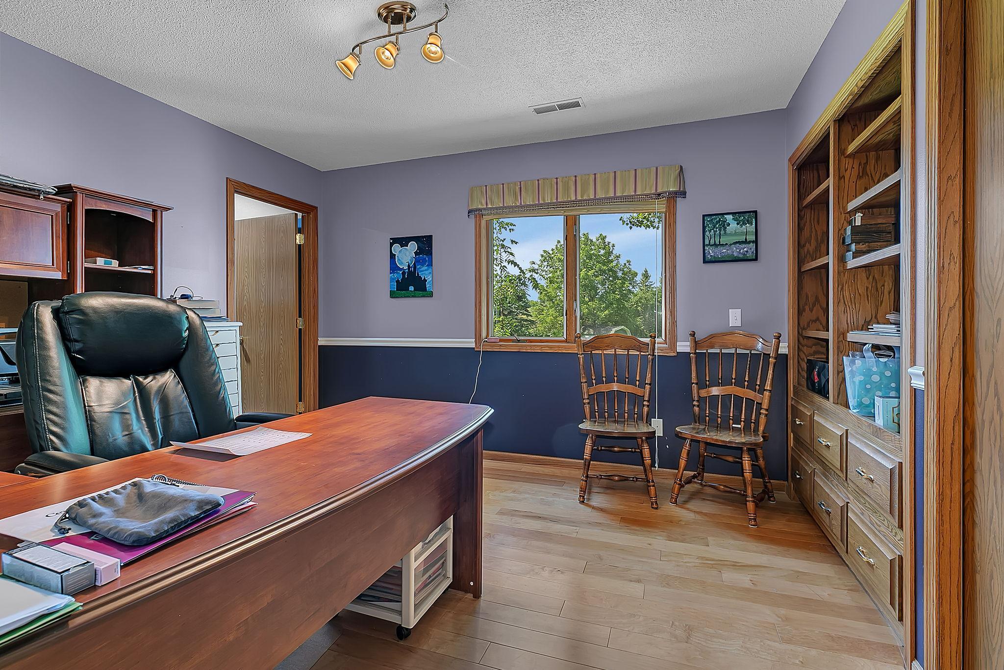 The 4th bedroom is on the main floor and is currently being used as an office