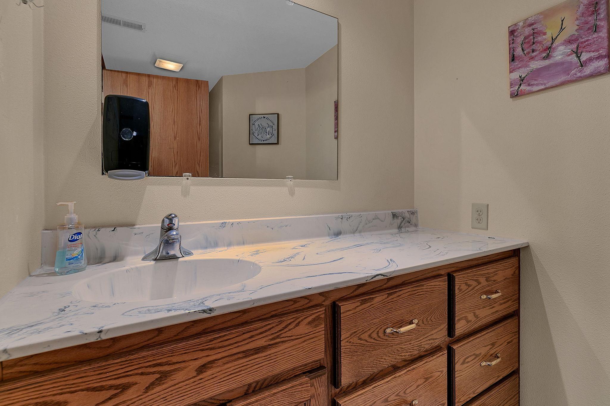 The last of 4 bathrooms is a half bath in the basement