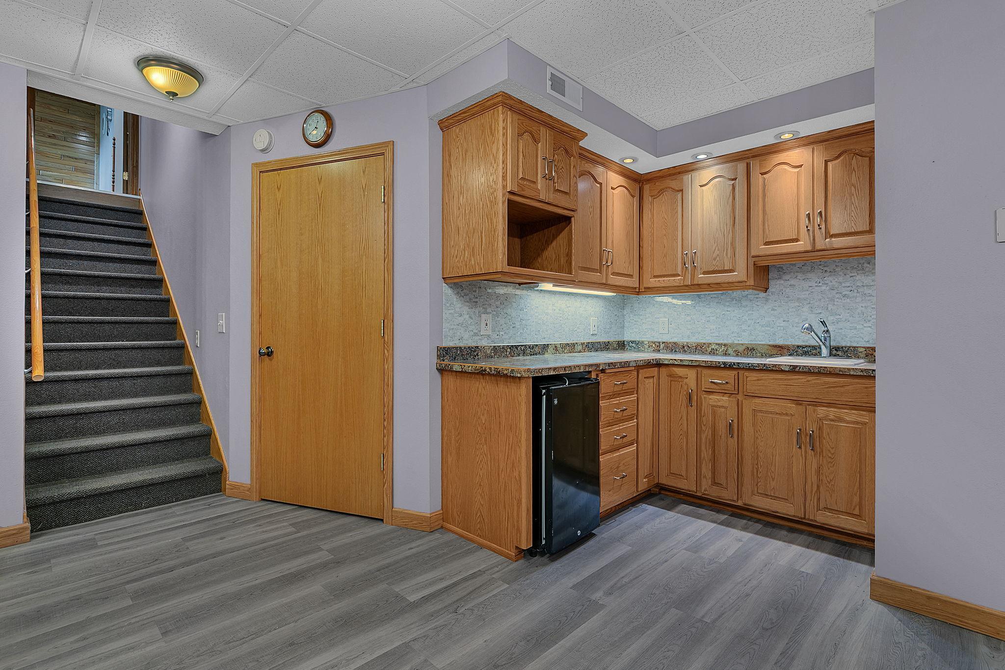 The basement also features a kitchenette